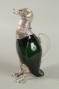 A GREEN COLOURED GLASS NOVELTY DUCK CLARET JUG with silver plated head and feet. 28cm high.