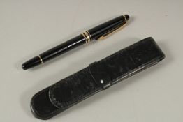 A MONT BLANC PEN in a leather case.