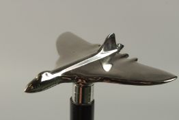 A WALKING STICK with chrome areoplane handle. 97cm long.