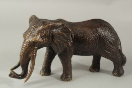 A GOOD BRONZE ELEPHANT. 28cms long.