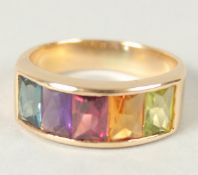 A MULTI-GEMSTONE 14CT GOLD RING.