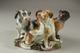 A GOOD MEISSEN PORCELAIN GROUP OF THREE DOGS, Model 2104, by JOHANN JOACHIM KAENDLER, 1840'S.