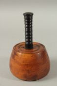 A GOOD LIGNUM VITAE WOODEN MALLET.