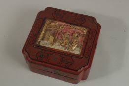 A CHINESE RED LACQUER BOX with carved and gilded inset panel. 23cm square.