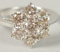 AN 18CT YELLOW GOLD 7 STONE DAISY STYLE DIAMOND CLUSTER RING with certificate. Diamonds 2.16ct,VS.