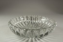 A HEAVY CRYSTAL GLASS BOWL. 28cms diameter.