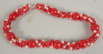 A SILVER CORAL AND PEARL NECKLACE.
