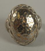 A .925 SILVER RED STONE RING.