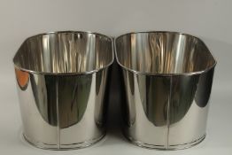 A LARGE PAIR OF CHAMPAGNE CHROME ICE BUCKETS. 60cm high 30cm wide.