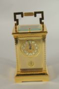 A VERY GOOD FRENCH GILDED REPEATER CARRIAGE CLOCK. Cameron & Foster, New York. 17cms high.