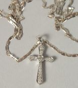 AN 18CT WHITE GOLD CHAIN WITH DIAMOND SET CROSS,boxed. RBC R/C diamonds .21ct.