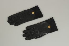 A PAIR OF SALVATORE FERRAGAMO LADIES LEATHER GLOVES, size 7.
