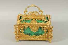 A GOOD MALACHITE AND ORMOLU CASKET with rising lid and velvet interior, the sides with curling
