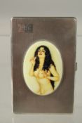 AN ENGINE TURNED SILVER CIGARETTE CASE, London 1947, with an oval enamel plaque of a nude with