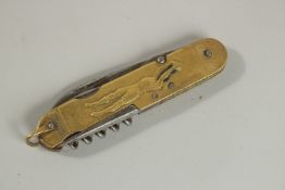 DEPUSE. A BRASS FACED TENNIS AND BASKET KNIFE.