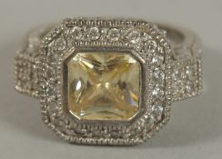 A .925 SILVER TOPAZ RING.