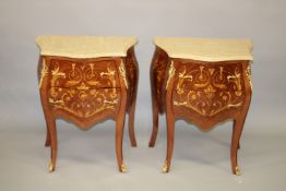 A PAIR OF LOUIS XVITH STYLE BOMBE FRONTED TWO DRAWER COMMODE with gilt metal mounts on curving feet.
