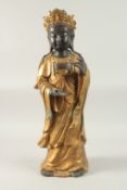 A CHINESE GILDED BRONZE STANDING GUANYIN, 59cm high.