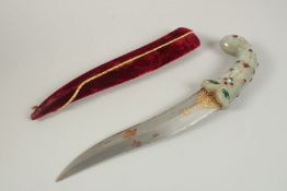 A DECORATIVE INDIAN HARDSTONE HANDLE DAGGER.