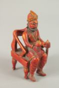A VERY FINE BARODA CARVED GILT WOOD FIGURE OF A THRONED KING / RAJA, C1800, possibly the father of