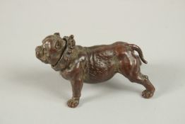 A BRONZE OKIMONO OF A DOG.