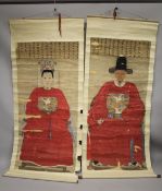 A VERY LARGE PAIR OF EMPEROR AND EMPRESS PAINTED SCROLL PANELS, paper laid onto silk, each