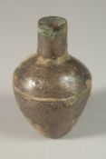 A RARE BRONZE SILVER TINTED POSSIBLY ACHAEMENID PERIOD 550BC OR LATER BOTTLE, 7cm high.
