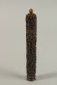 A FINELY CARVED 19TH CENTURY CHINESE CANTON RHINO HORN CYLINDRICAL CASE, depicting phoenix and