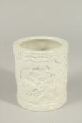 A LATE 19TH CENTURY CHINESE WANG BING RONG PORCELAIN BITONG / BRUSHPOT, with carved dragons and carp