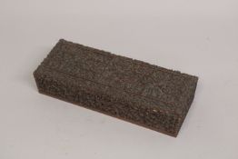 A FINE 19TH CENTURY ANGLO INDIAN CARVED SANDELWOOD BOX, with fine foliate carving and panels of