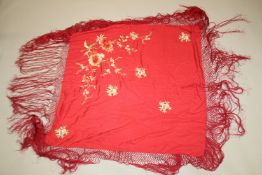 A CHINESE RED SILK SHAWL.