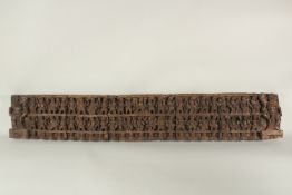 A LARGE AND FINLEY CARVED 19TH CENTURY INDIAN WOODEN PANEL, carved with multiple figures, 120cm x