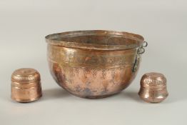 AN OMANI ENGRAVED COPPER BOWL, together with two copper boxes, (3).