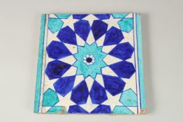 A FINE 18TH-19TH CENTURY INDIAN MULTAN GLAZED POTTERY TILE, with geometric designs, 27cm x 27cm.