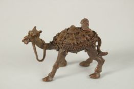 A BRONZE OKIMONO OF A CAMEL.