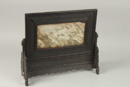 A CHINESE VARIEGATED MARBLE INSET HARDWOOD TABLE SCREEN, 37cm high, 41cm wide.