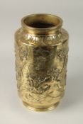 A SUPERB LARGE CHINESE ENGRAVED AND RELIEF DECORATED BRASS VASE, the raised decoration depicting