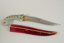 A DECORATIVE INDIAN HARDSTONE HANDLE DAGGER.