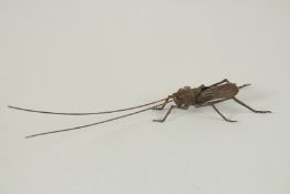 A BRONZE OKIMONO OF A LONGHORN BEETLE.