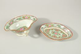 A CHINESE CANTON PORCECLAIN SAUCE BOAT AND STAND, sauce boat 21cm wide, stand 20.5cm wide, (2).