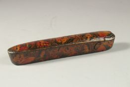 A PERSIAN QAJAR LACQUERED PAPIER MACHE QALAMDAN PEN CASE, painted with portraits, the interior