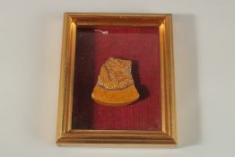 AN 18TH-19TH CENTURY CHINESE GLAZED POTTERY TILE FRAGMENT, depicting a dragon, inset within glazed