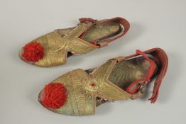 A PAIR OF BALKAN EMBROIDERED SLIPPERS.