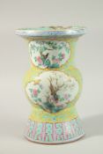 AN 18TH CENTURY CHINESE FAMILLE JAUNE PORCELAIN VASE, with painted enamels depicting panels of