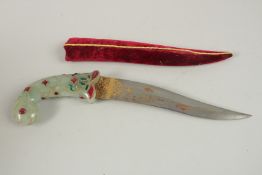 A DECORATIVE INDIAN HARDSTONE HANDLE DAGGER.