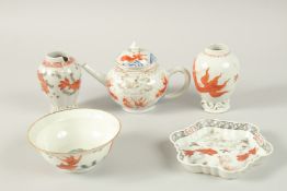 A COLLECTION OF FIVE CHINESE QIANLONG PORCELAIN PIECES, painted with carp in copper red,