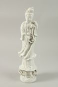 A BLANC-DE-CHINESE PORCELAIN GUANYIN, with applied sticker to base, 36cm high.