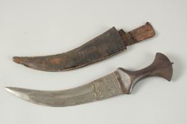 A 19TH CENTURY INDIAN CHISELLED STEEL DAGGER, 35cm long.