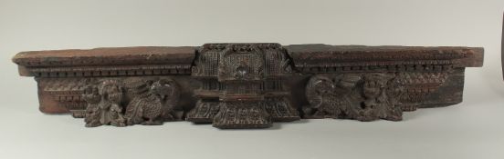 AN 18TH CENTURY SOUTH INDIAN CARVED WOODEN ARCHITECTURAL PANEL, together with a similar smaller