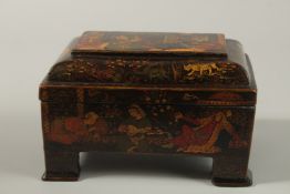 A VERY FINE PERSIAN QAJAR LACQUERED PAPIER MACHE BOX, painted with scenes of figures drinking and